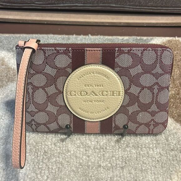 Coach Dempsey Wine Jacquard Large Wristlet - Picture 1 of 4